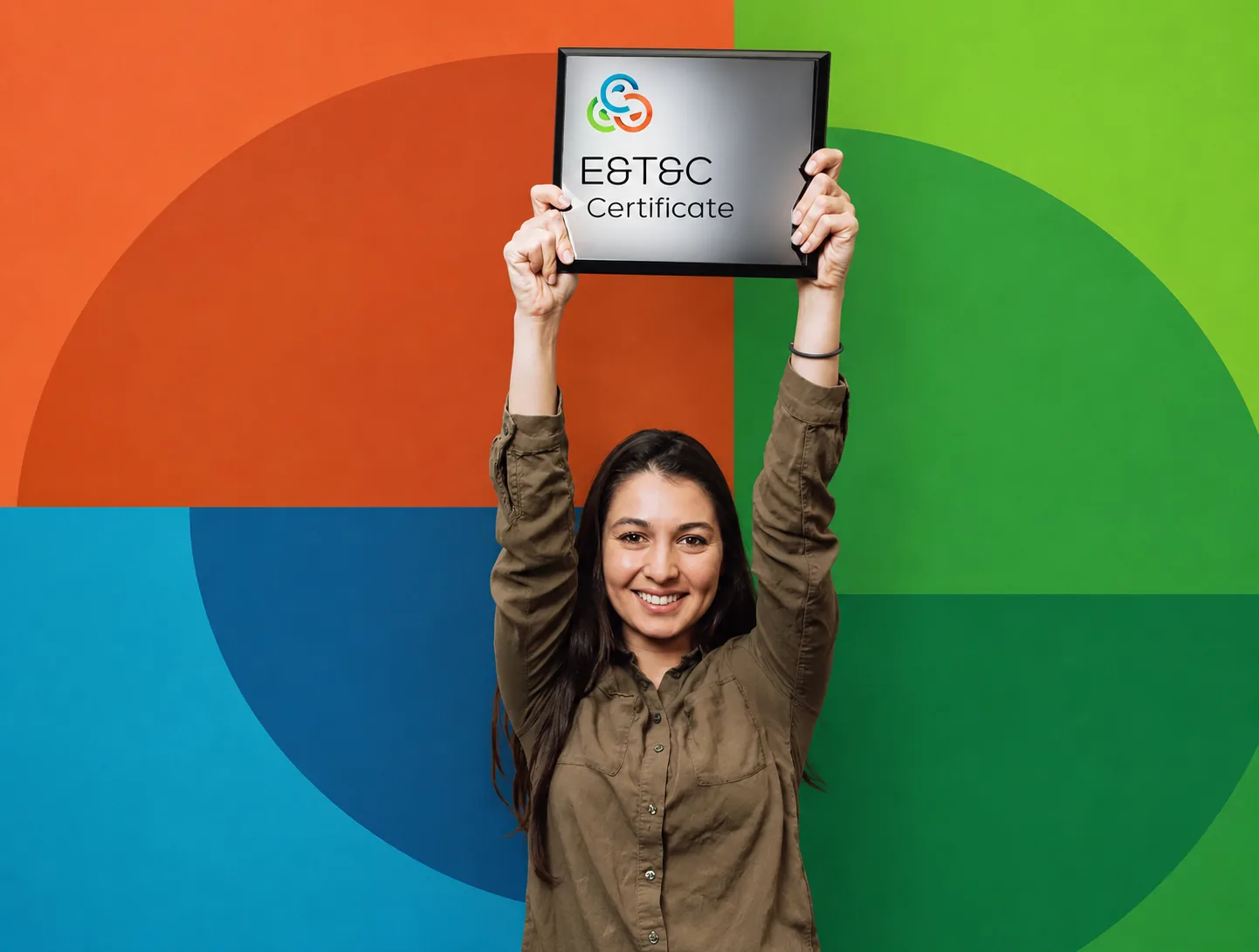 Woman holding up the E&T&C Certificate